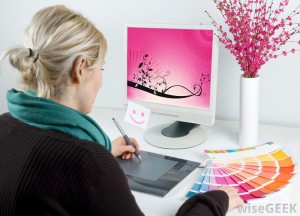 graphic-designer-works-on-computer